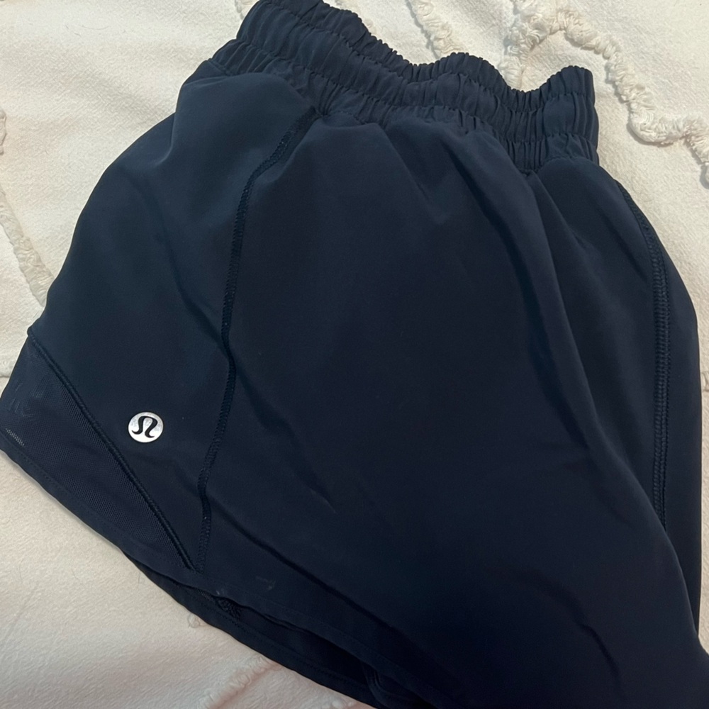 Navy lululemon hotty hot shorts.